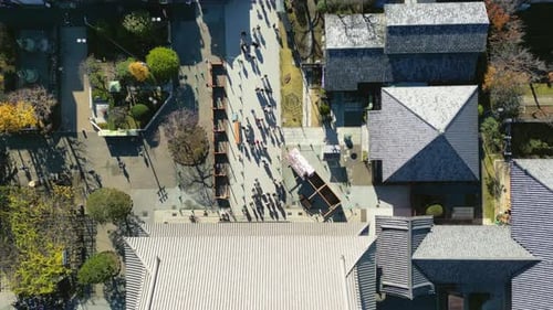 Top down drone shot over the Sensō-ji temple in Asakusa, Tokyo, sunny, fall day