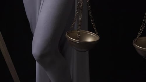 Close Up of the Human Statue of Themis Lifting Up the Scales