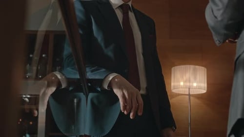 Businessmen Shaking Hands in an Office