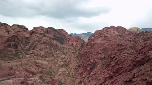 Aerial flying toward red rocks at Red Rock Canyon Nevada
