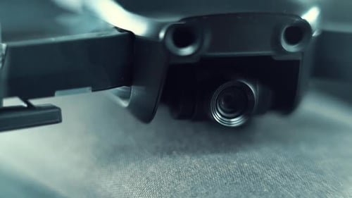 Drone Camera Lens on a stabilizer, propellers and sensors, hyper close up, aerial photography gear,