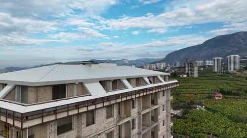 Aerial View of the Facade of a House at a Construction Site