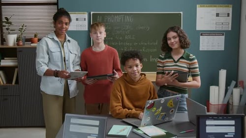 Portrait of Four Multicultural Students at Artificial Intelligence Lesson