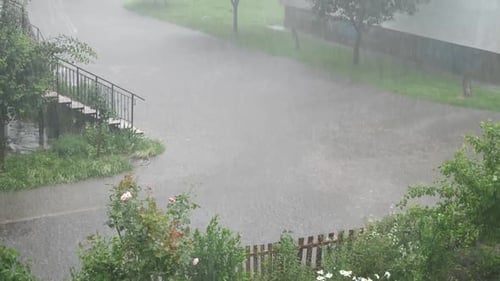 08, Torrential rains flooded the streets. The storm caused great damage to the city.