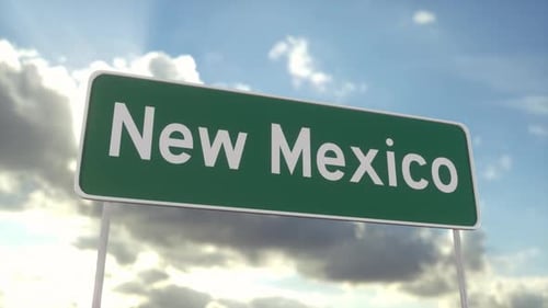 Welcome to New Mexico. New Mexico road sign on a blue sky. Travel, business, tourism