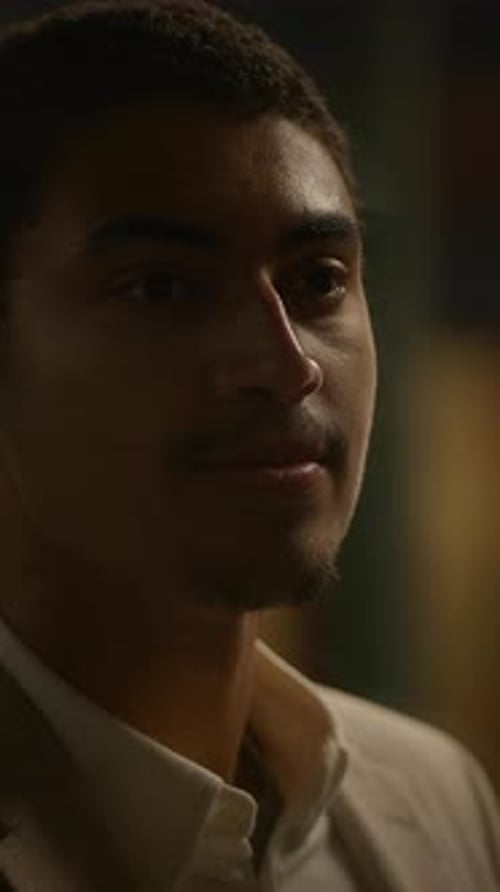 A Man in a Suit Shows a Focused Expression Reflecting a Profound State of Contemplation