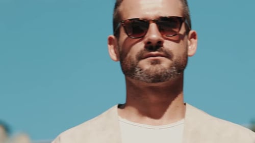 Stylish Man With Sunglasses Posing Outdoors