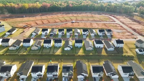 Aerial View of Real Estate Development with Tightly Located Family Houses Under Construction in