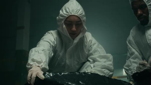 Figures in Suits Investigate Crime Scene
