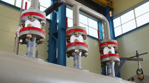 Pipes Connected to Reservoir at Gas and Oil Refinery Plant