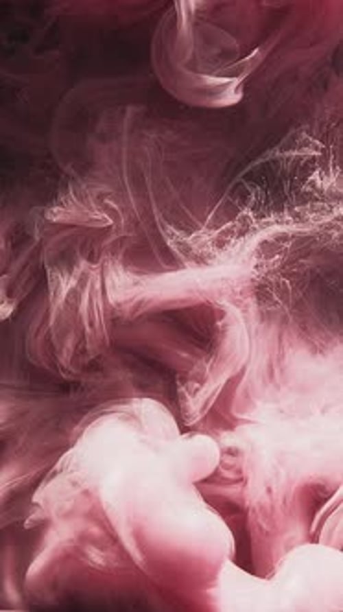 Abstract Swirling Pink Ink Background