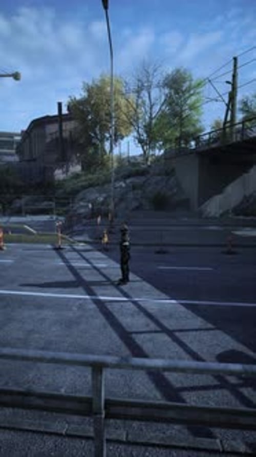 Road Worker Focuses Intently While Directing Traffic on a Busy City Street