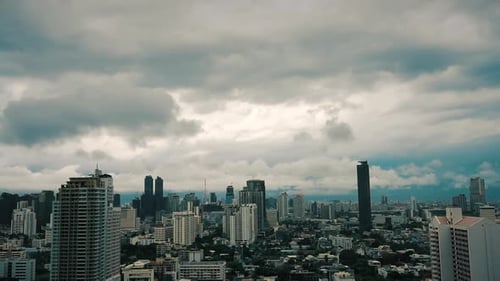 A storm forming over city skyline. Beautiful timelapse of changing weather over the city.