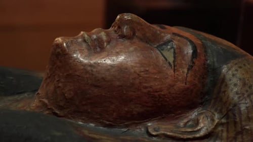 Sarcophagus Face Close Up In Warm Lighting