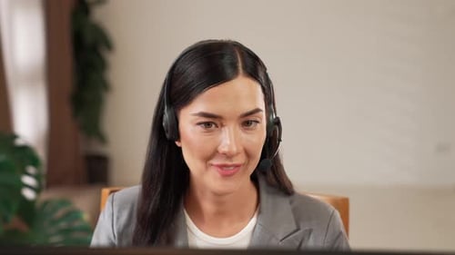 Female call center operator or customer service helpdesk staff. Blithe