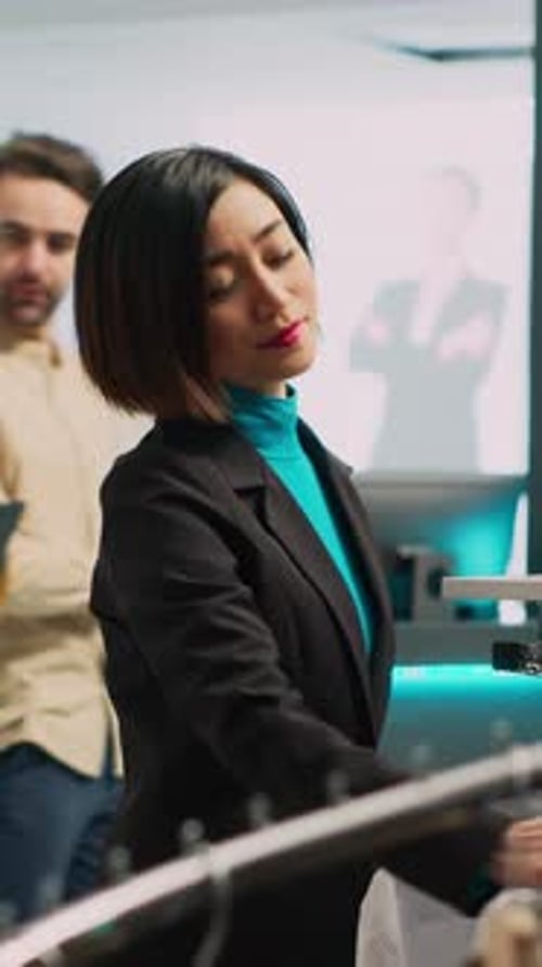 Vertical Video Asian Customer Looking at Formal Wear Shirt in Retail Shop