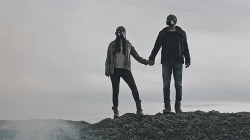 Couple Holding Hands in Dystopian Post-Apocalyptic Landscape