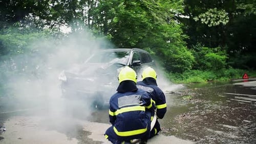 Firefighters Respond to Car Crash in Wooded Area