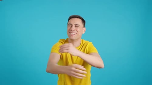 Excited Man Showing Range of Emotions on Blue Background
