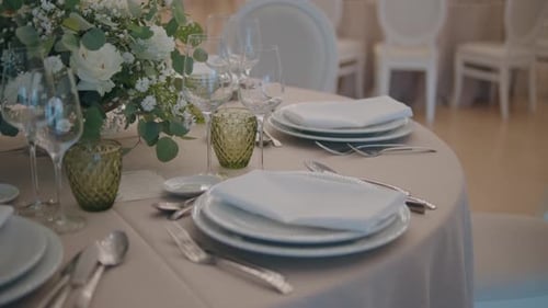 Elegant Wedding Table Setting with Floral Centerpiece