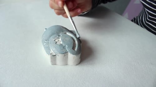 Child Painting Gray Ceramic Animal Figurine