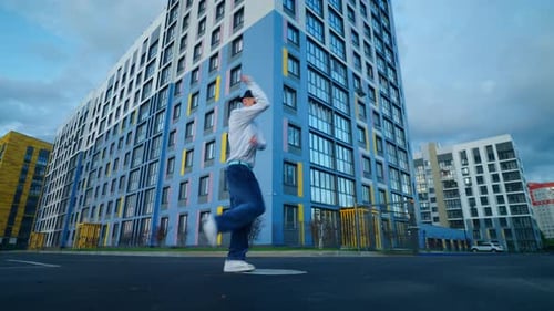 HipHop Dancer In Urban Landscape Young Man Performing Contemporary Dance On City Streets