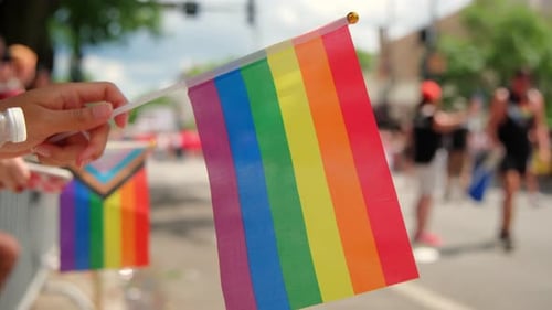 Pride Flags Fly at Cheerful City Event