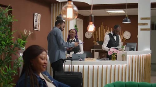 Hotel Guest Signing Form at Reception Desk