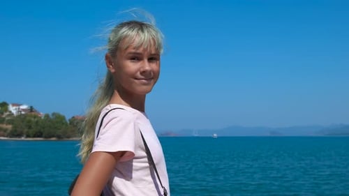 Happy tourist near the sea.
