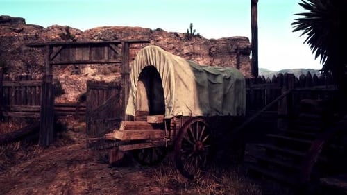 Un vagón cubierto vintage en un entorno rural rústico