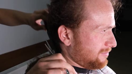 Haircut with Scissors and Comb, Close-Up