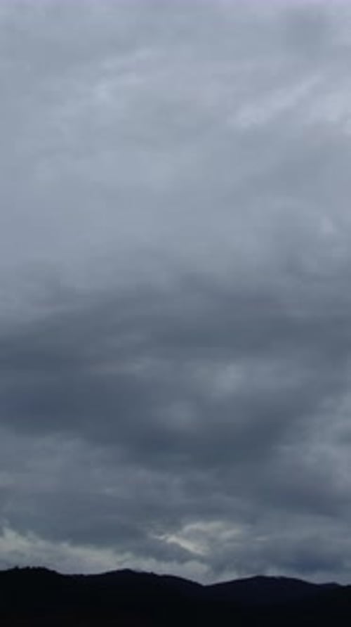 Dramatic Clouds Moving Across Overcast Sky
