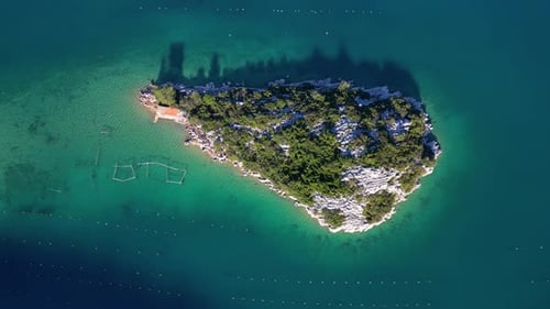 Aerial drone view of a small island in the bay of Mali Ston located on Peljesac peninsula