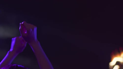 A Girl at a Concert Dancing in the Atmosphere of a Nightclub Beautiful Hand Movements a Night City