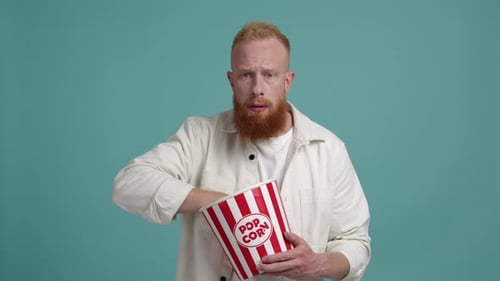 Portrait of a Guy Watching Adventurous Thriller Movie in the Cinema