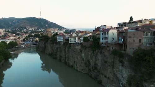Old Town Of Tbilisi And Mtkvari River In The Caucasus During Sunrise In Georgia. Aerial Shot