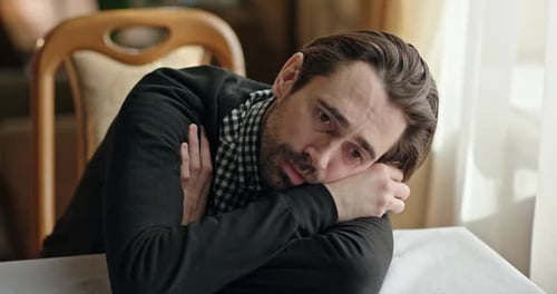 Man Surprised and Laughing Indoors