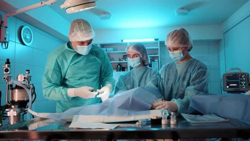 Surgeons Performing Delicate Procedure in Operating Room