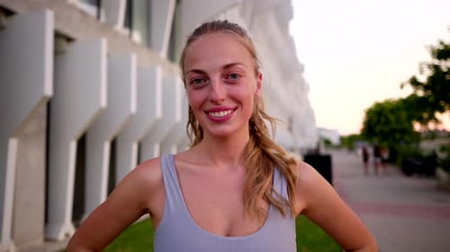 Blonde Woman Smiling Portrait in City