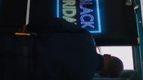 Man Opens Door for Two People