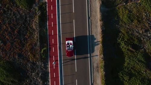 Drone Shot of Convertible Vintage Red Car on Road