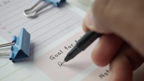 Pay Debt Word Writing on a Notepad