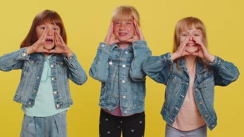 Three Energetic Children Yelling Together in Studio
