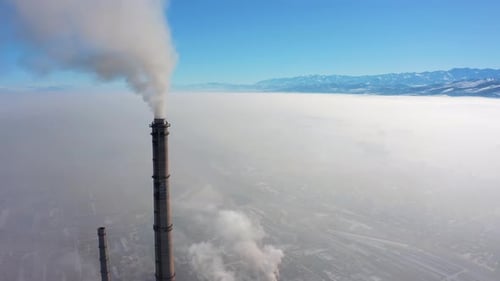 Pipes of a factory with harmful emissions into the environment