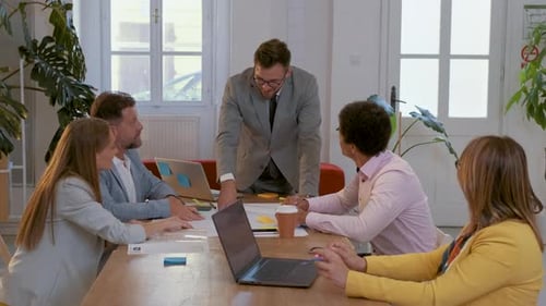 Group of business people working in office.