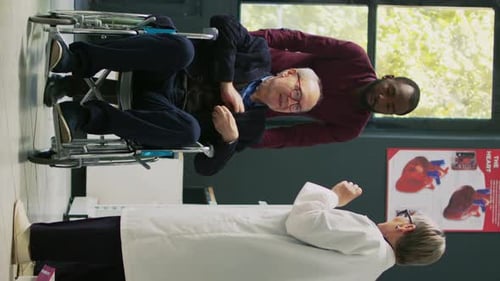 Doctor Delivers Medical Results to Elderly Patient in Wheelchair