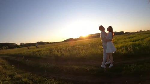 Fast Circle Drone Flight and Aerial View of Happy Romantic Lovely Couple of Happy Family Man and