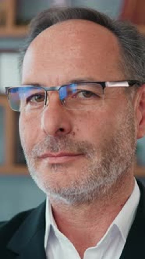 Close Up Portrait of Likable Successful Highskilled Bearded Head of Company in Eyewear Dreamly