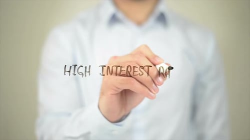 Writing High Interest Rates on Clear Surface