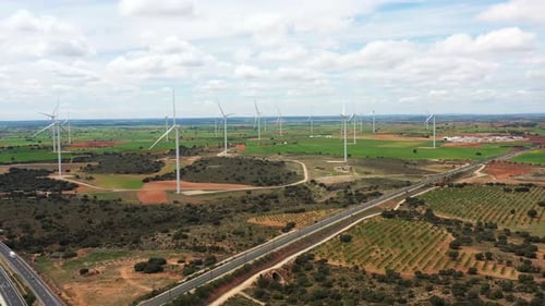 Aerial View of Wind Turbines on Rural Landscape